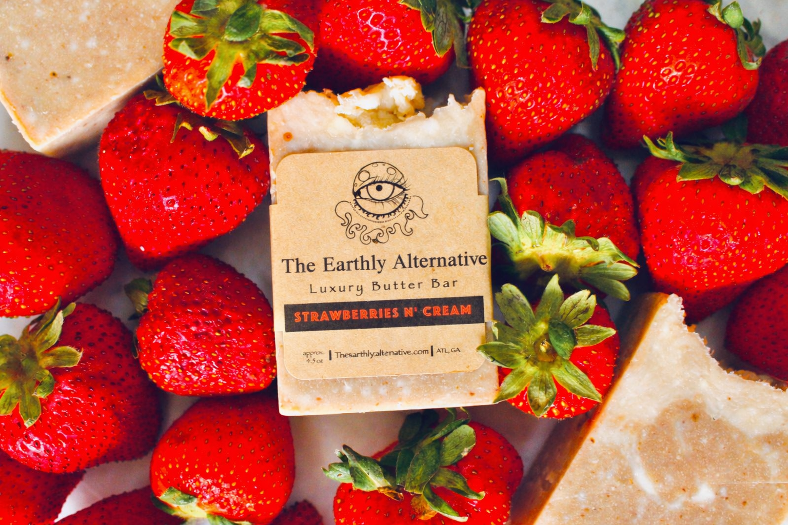 Strawberries N' Cream Butter Bar by The Earthly Alternative, showing a creamy butter bar with strawberry and cream accents.