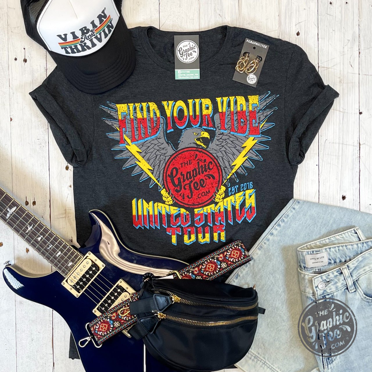 Unisex short sleeve graphic tee featuring US tour concert design by The Graphic Tee, casual style with vibrant print.
