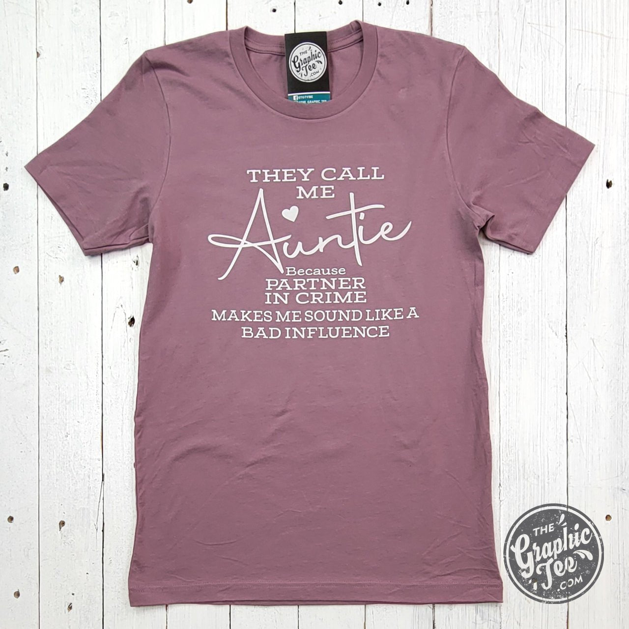 They Call Me Auntie short sleeve graphic tee by The Graphic Tee, featuring casual fit and playful design on a white cotton shirt.