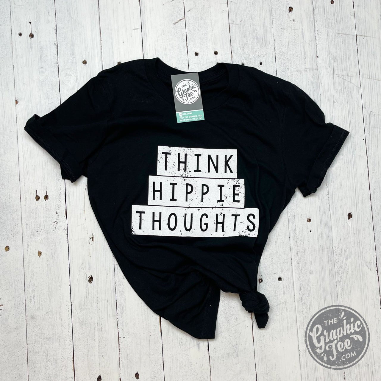 Unisex Think Hippie Thoughts graphic T-shirt by The Graphic Tee, featuring a colorful hippie-inspired design on a casual SS tee.