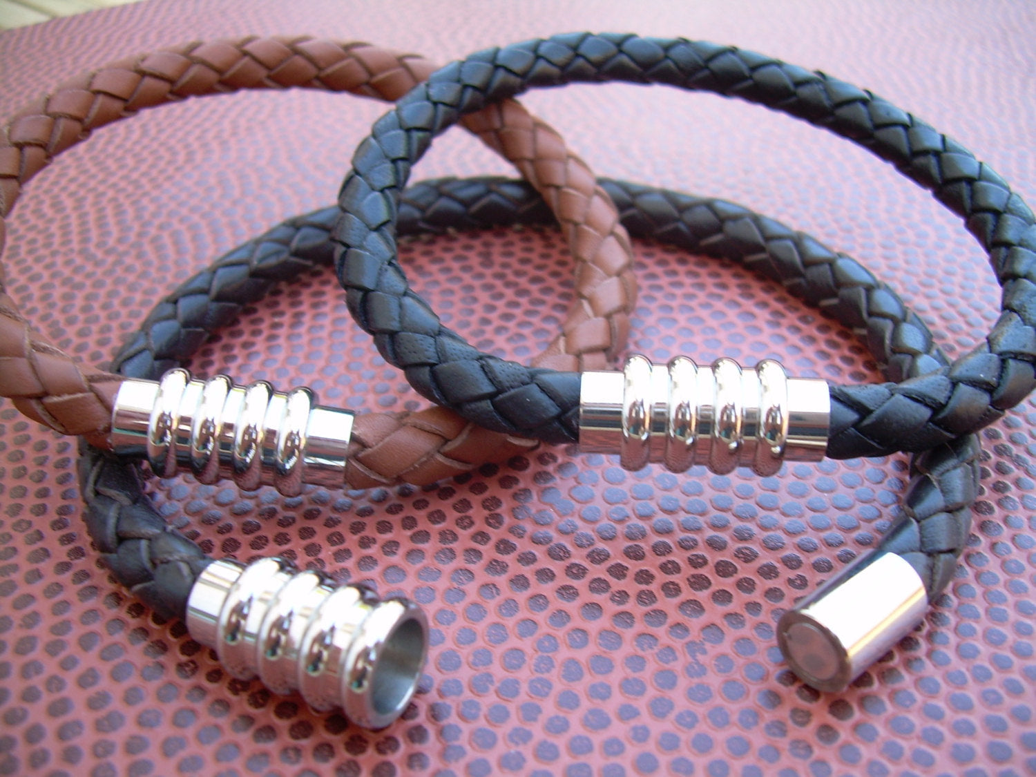 Black braided men's leather bracelet with stainless steel magnetic clasp, designed for a 6.75-inch wrist, by Urban Survival Gear USA.