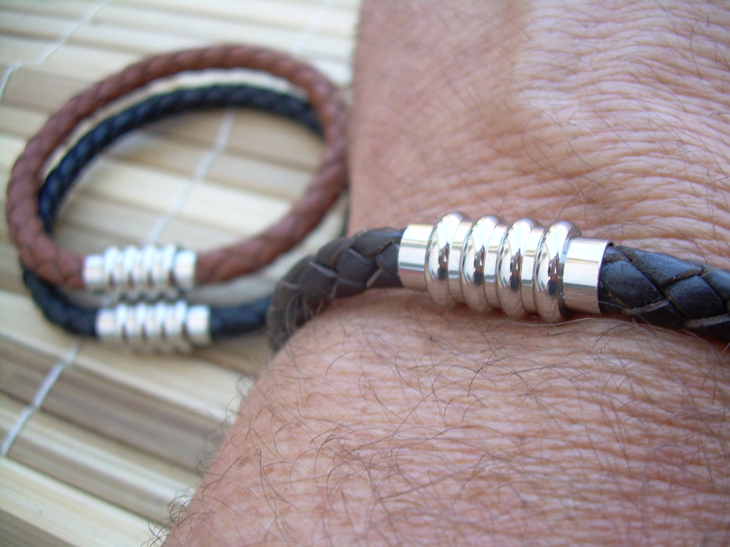 Men's black leather bracelet with stainless steel magnetic clasp, braided design, fits a 6.75-inch wrist, by Urban Survival Gear USA