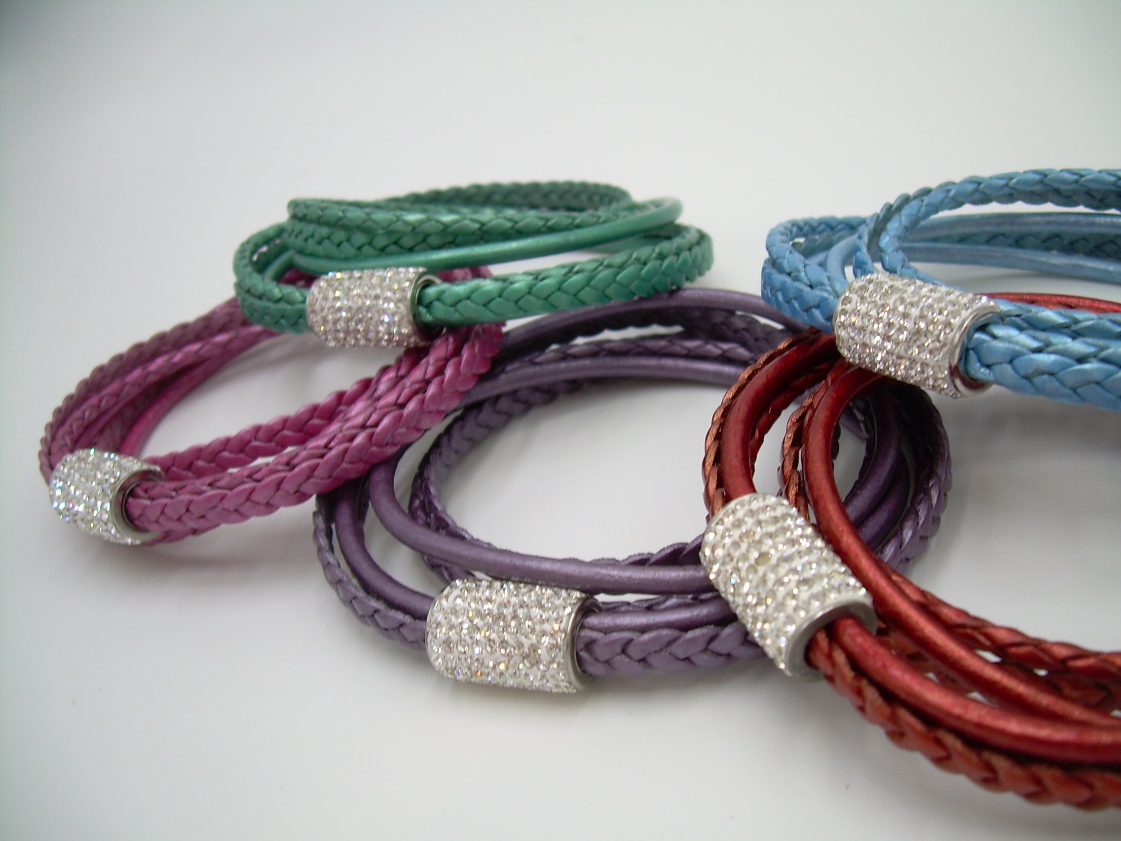 Women's rhinestone and leather wrap bracelet with stainless steel magnetic clasp, metallic pearl accents, fits a 6-inch wrist.