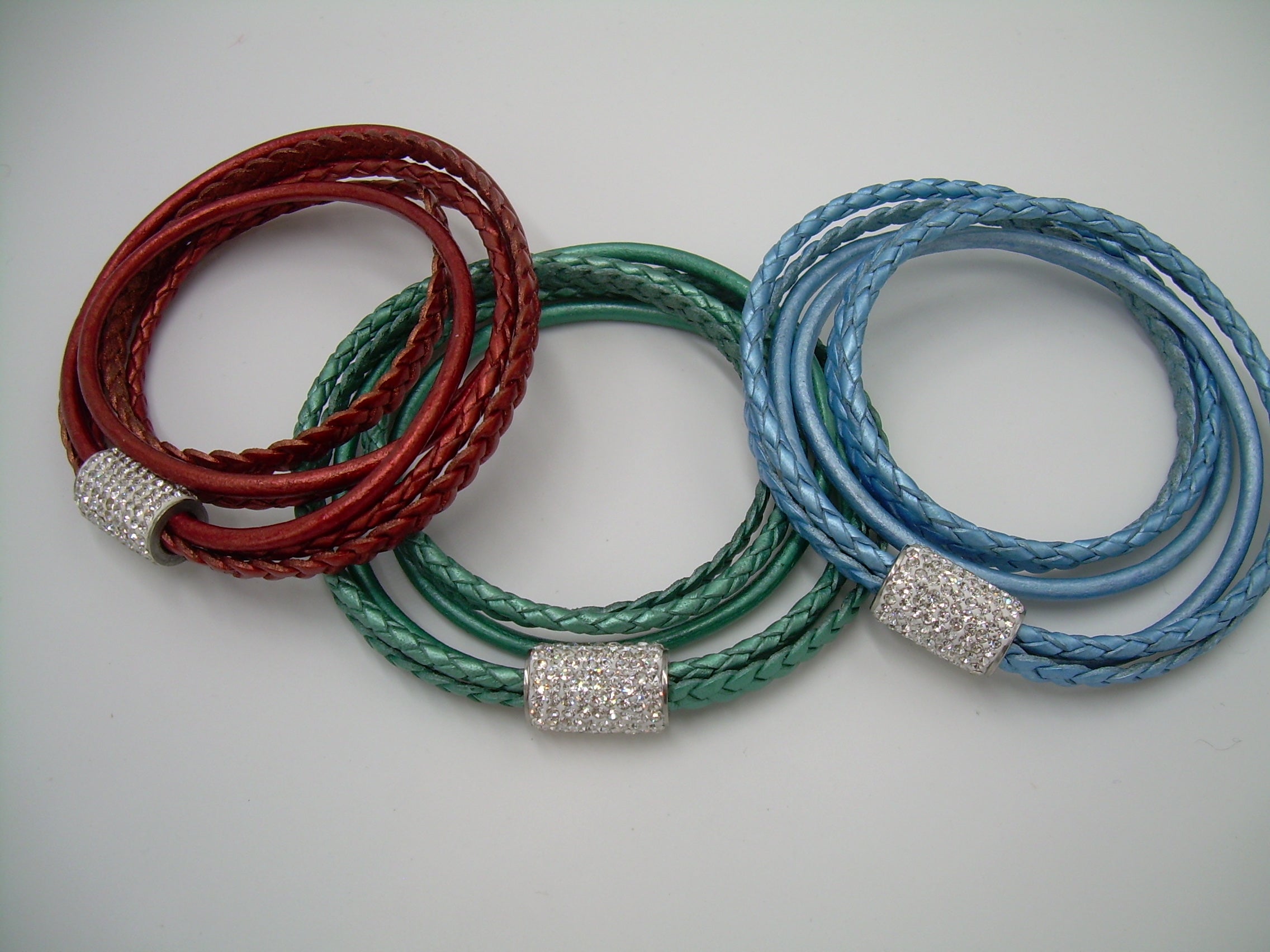 Women's rhinestone and leather wrap bracelet with stainless steel magnetic clasp, metallic pearl finish, fits 6-inch wrist.