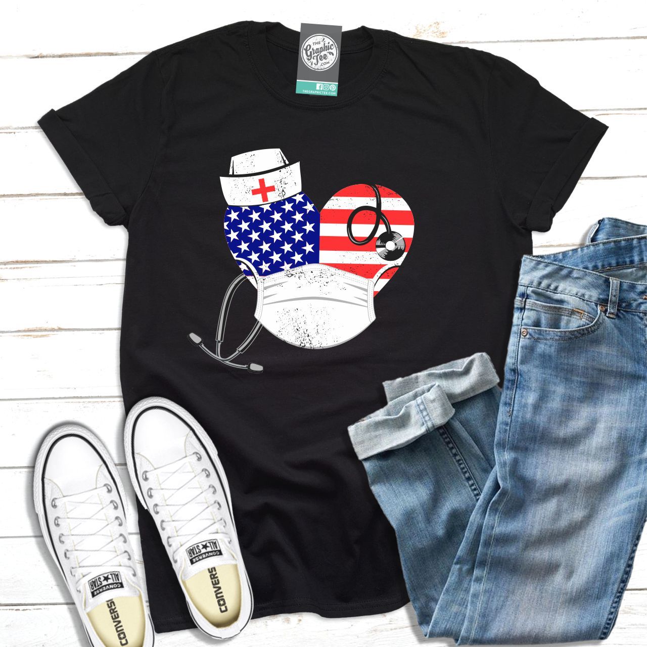 Unisex SS graphic tee with USA nurse heart design by The Graphic Tee, featuring a patriotic red, white, and blue nurse heart graphic.