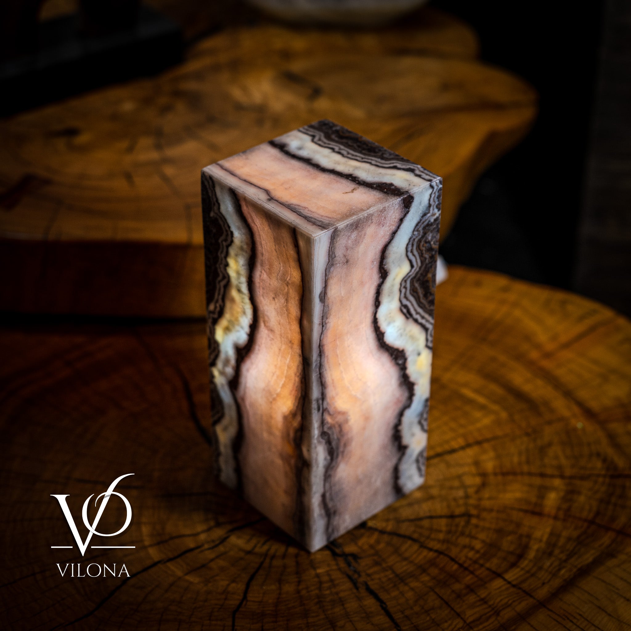 Vilona Onyx Razzberry Rosa Onyx desk lamp with vibrant pink and orange hues, modern design, and smooth finish.