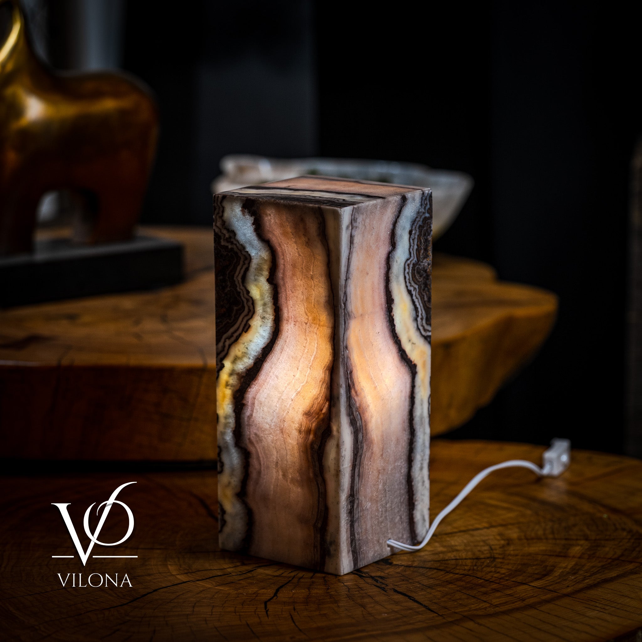 Vilona Onyx Razzberry Rosa Onyx desk lamp with a vibrant pink and purple ceramic base and a white fabric shade.