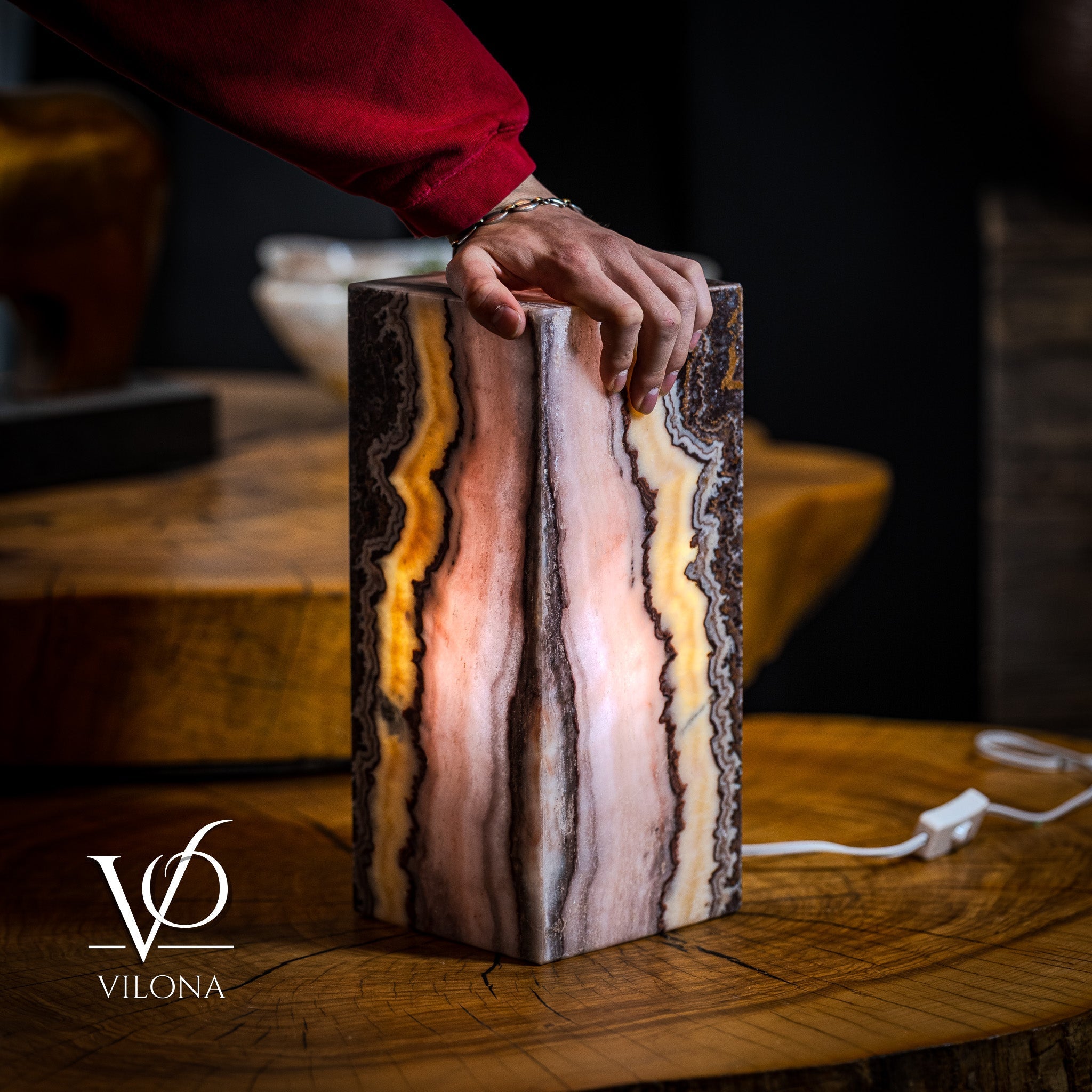 Vilona Onyx Razzberry Rosa Onyx desk lamp with a sleek table lamp design and vibrant pink and purple onyx finish.