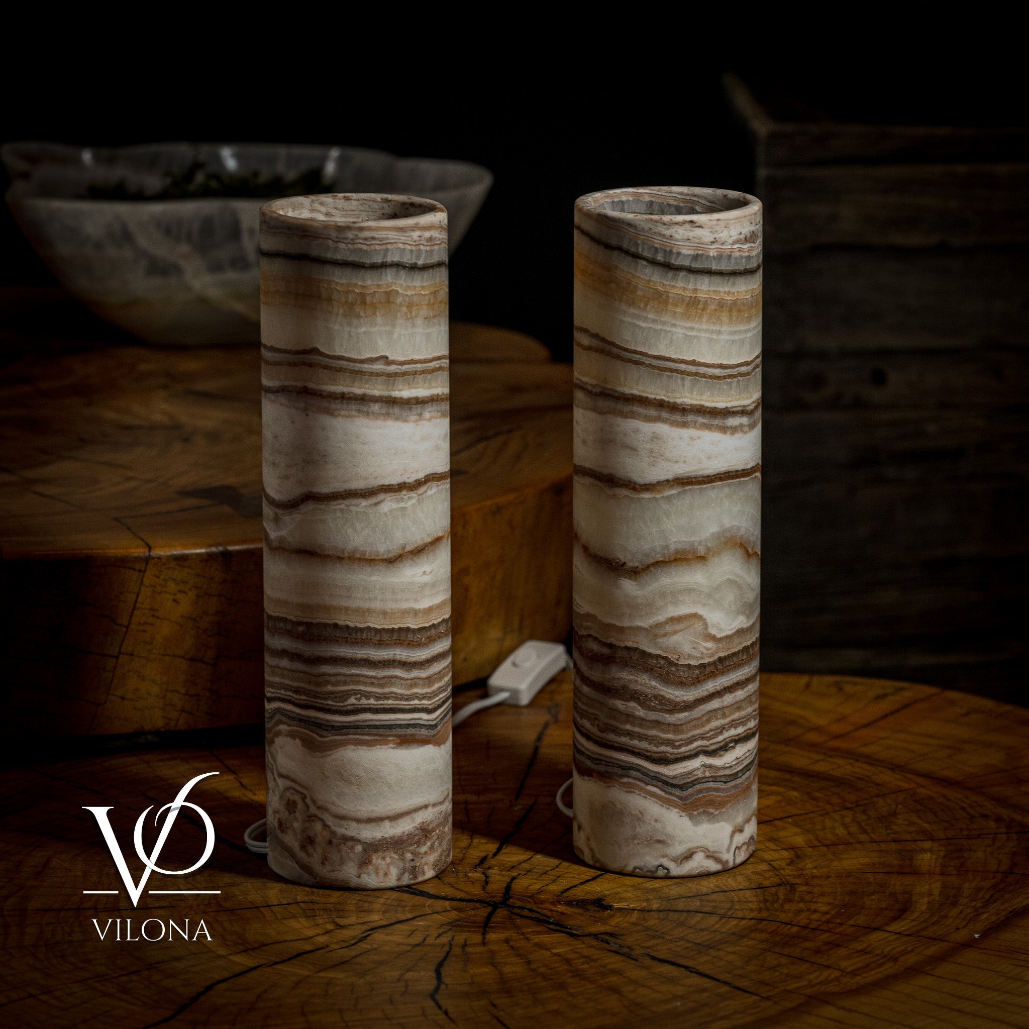 Pair of Vilona Onyx Sahara Onyx desk lamps featuring cylindrical design and warm onyx stone finish, perfect for modern table lighting.