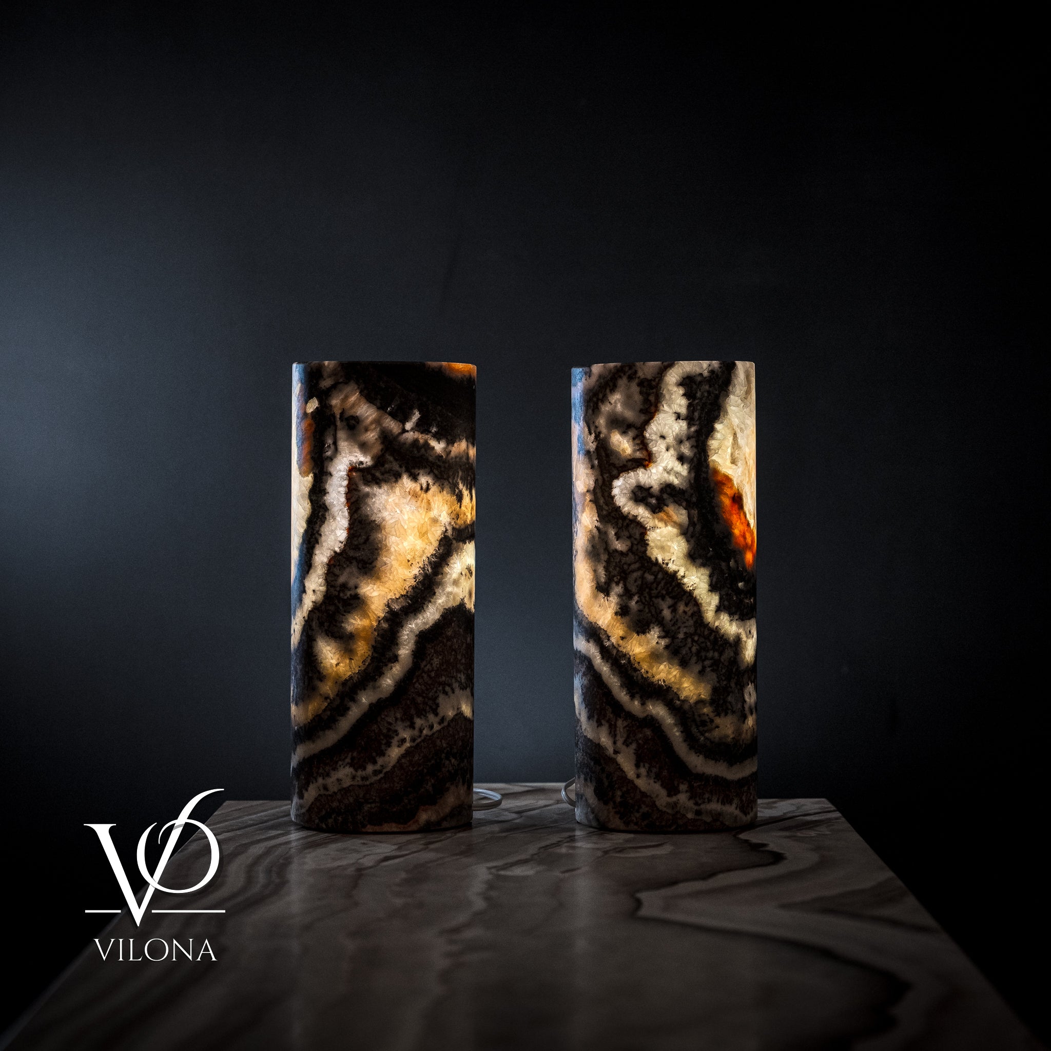 Pair of Vilona Onyx Tangerine Crystal desk lamps featuring vibrant crystal accents and sleek black bases.