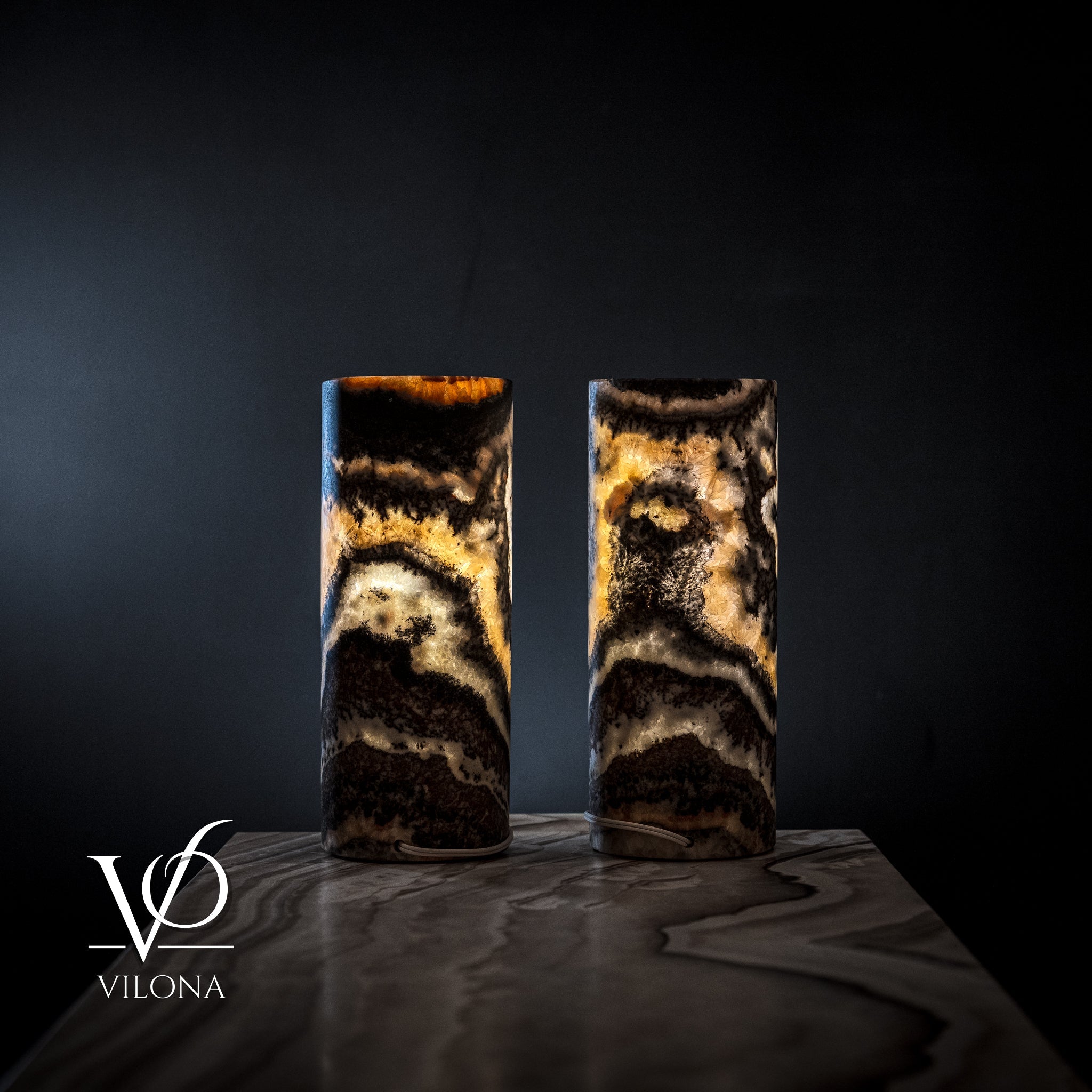 Pair of Vilona Onyx Tangerine Crystal desk lamps featuring vibrant tangerine-colored crystal onyx bases and sleek modern design.