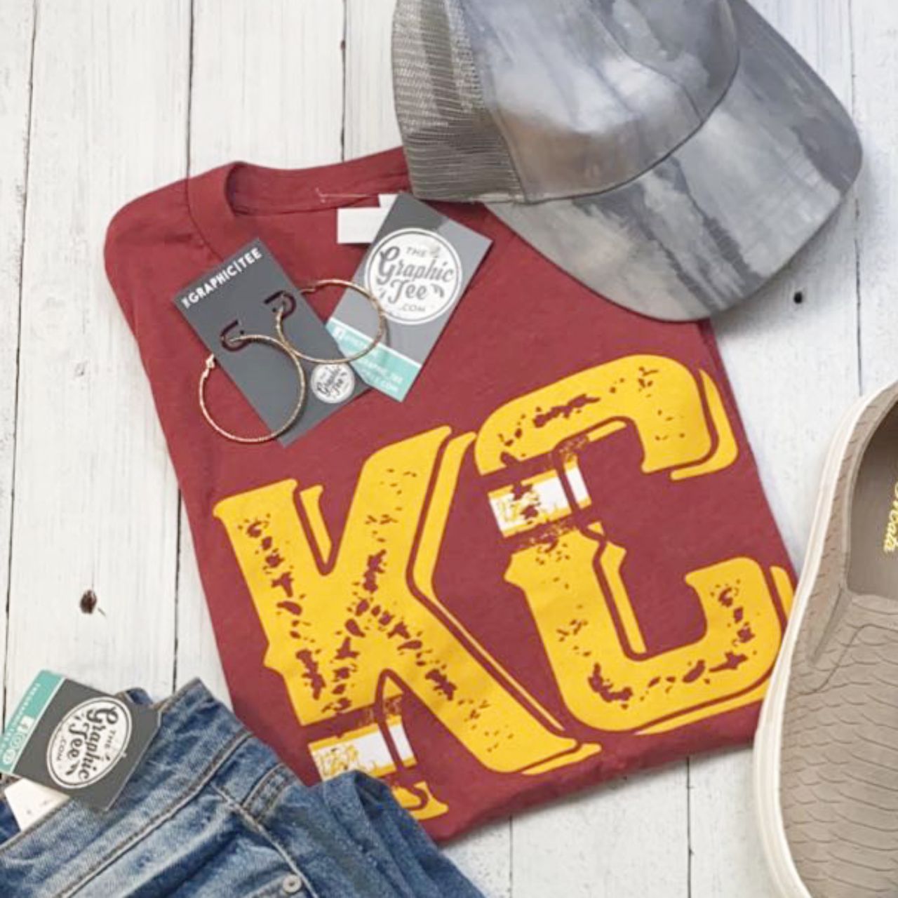 Vintage KC short sleeve graphic tee by The Graphic Tee, showcasing retro Kansas City design on soft cotton fabric.