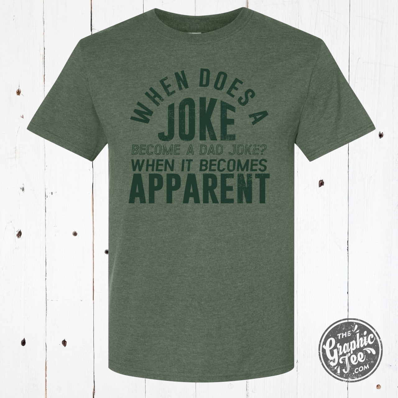 Short sleeve graphic tee by The Graphic Tee featuring humorous "When Does A Joke Become A Dad Joke?" design.