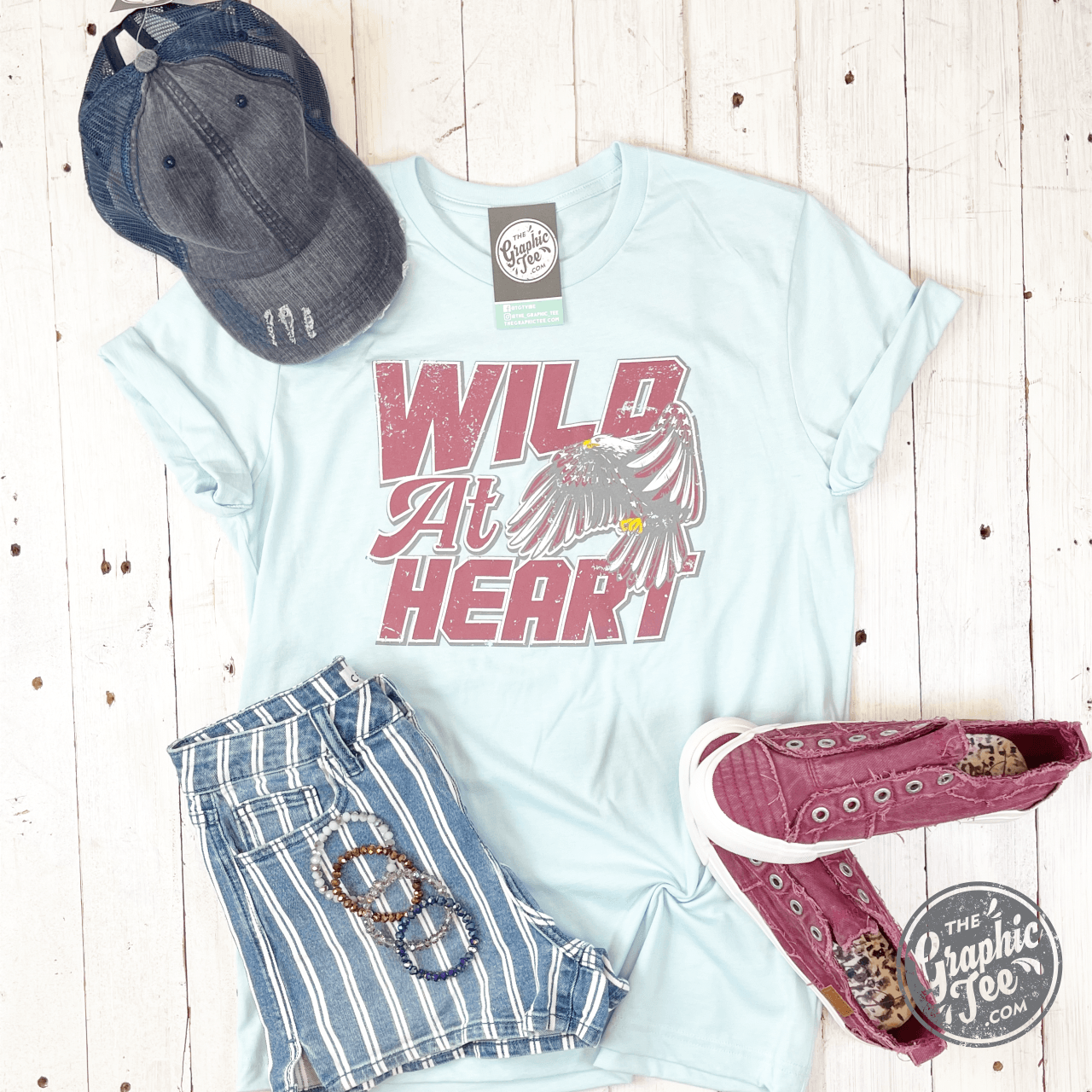 Wild At Heart crew neck graphic T-shirt from The Graphic Tee, featuring a bold wild design on a comfortable crew neck tee.