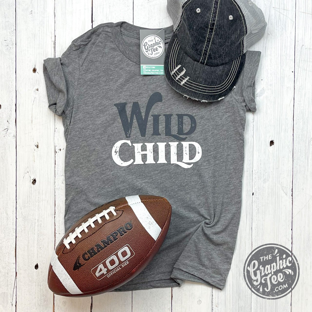 Youth graphic tee featuring a wild child design by The Graphic Tee, made for comfortable youth casual wear.