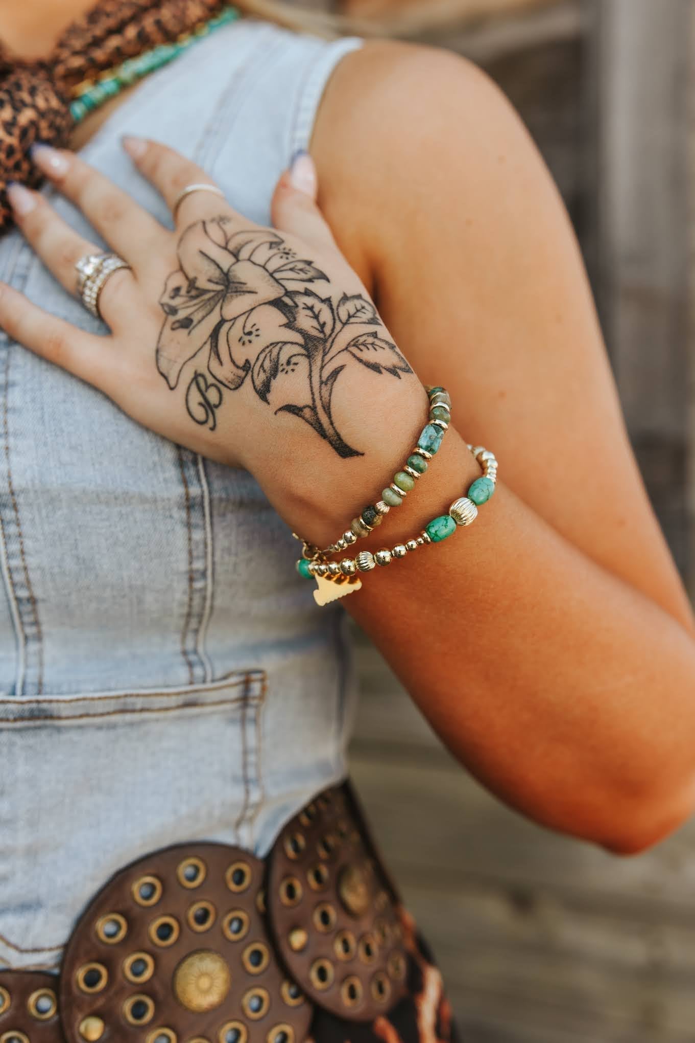 Gold desert turquoise beaded bracelet from Wild Junkie featuring vibrant turquoise stones and gold-toned beads.