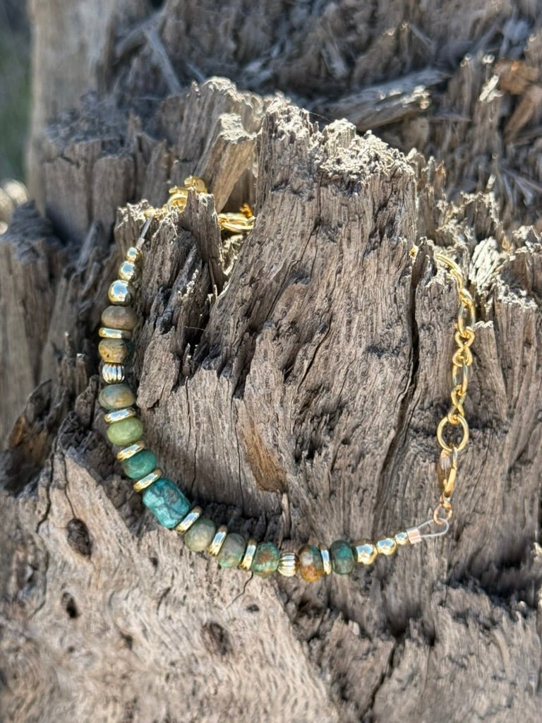 Gold desert turquoise beaded bracelet by Wild Junkie featuring vibrant turquoise beads and gold accents on a delicate bracelet.