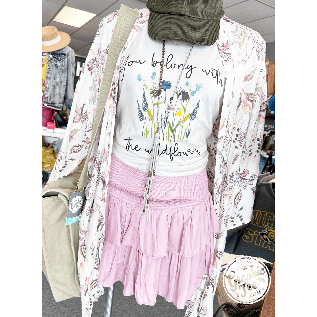 You Belong with the Wildflowers V-Neck Tee by The Graphic Tee, soft cotton SS graphic tee with floral design and relaxed fit.