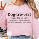 Dogtrovert graphic tee by Anchored Grace Boutique featuring a playful dog illustration on a casual cotton t-shirt.