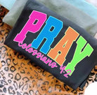 Pray Neon graphic tee by Anchored Grace Boutique featuring vibrant neon prayer design on casual cotton t-shirt.