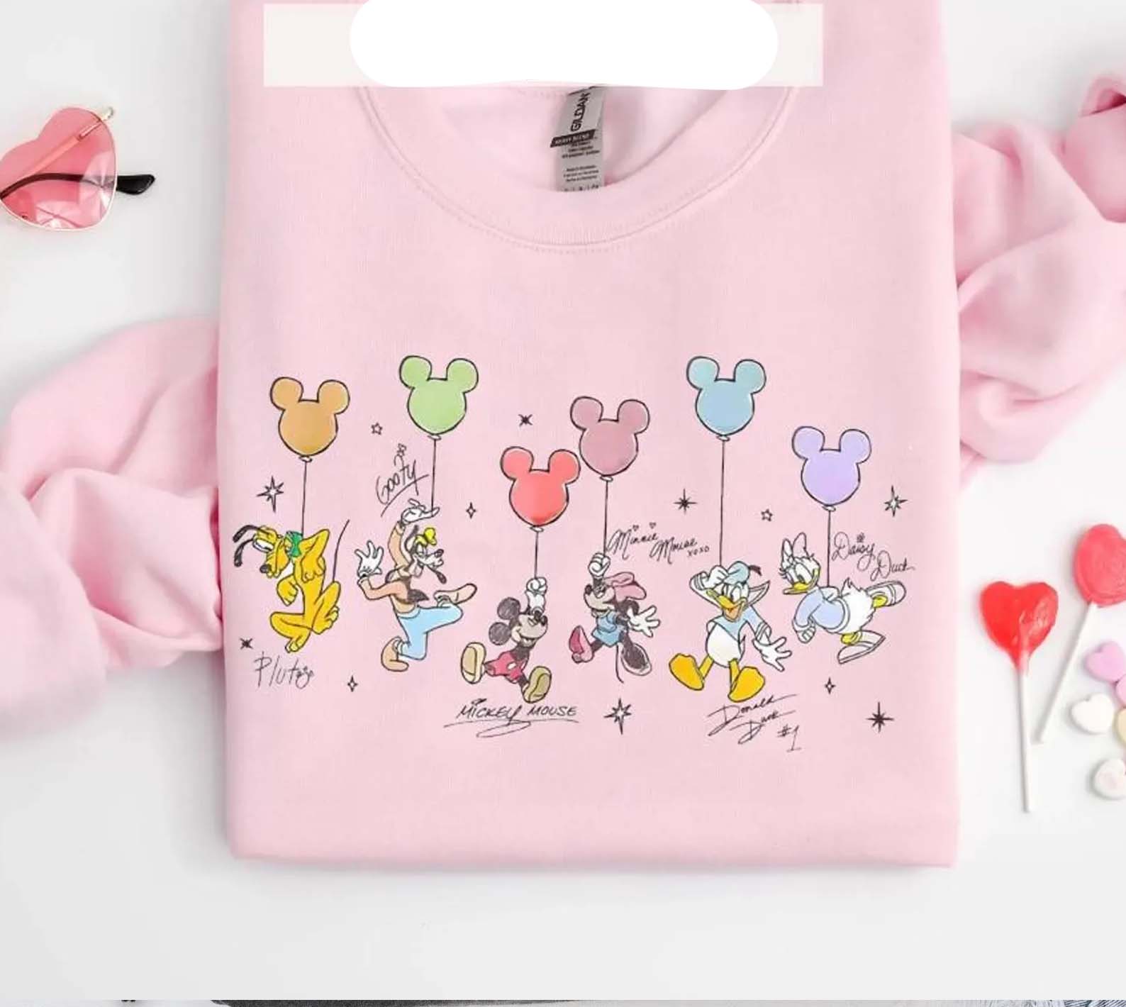Colorful balloon friends graphic tee for kids by Anchored Grace Boutique, featuring playful balloon illustrations on soft fabric.