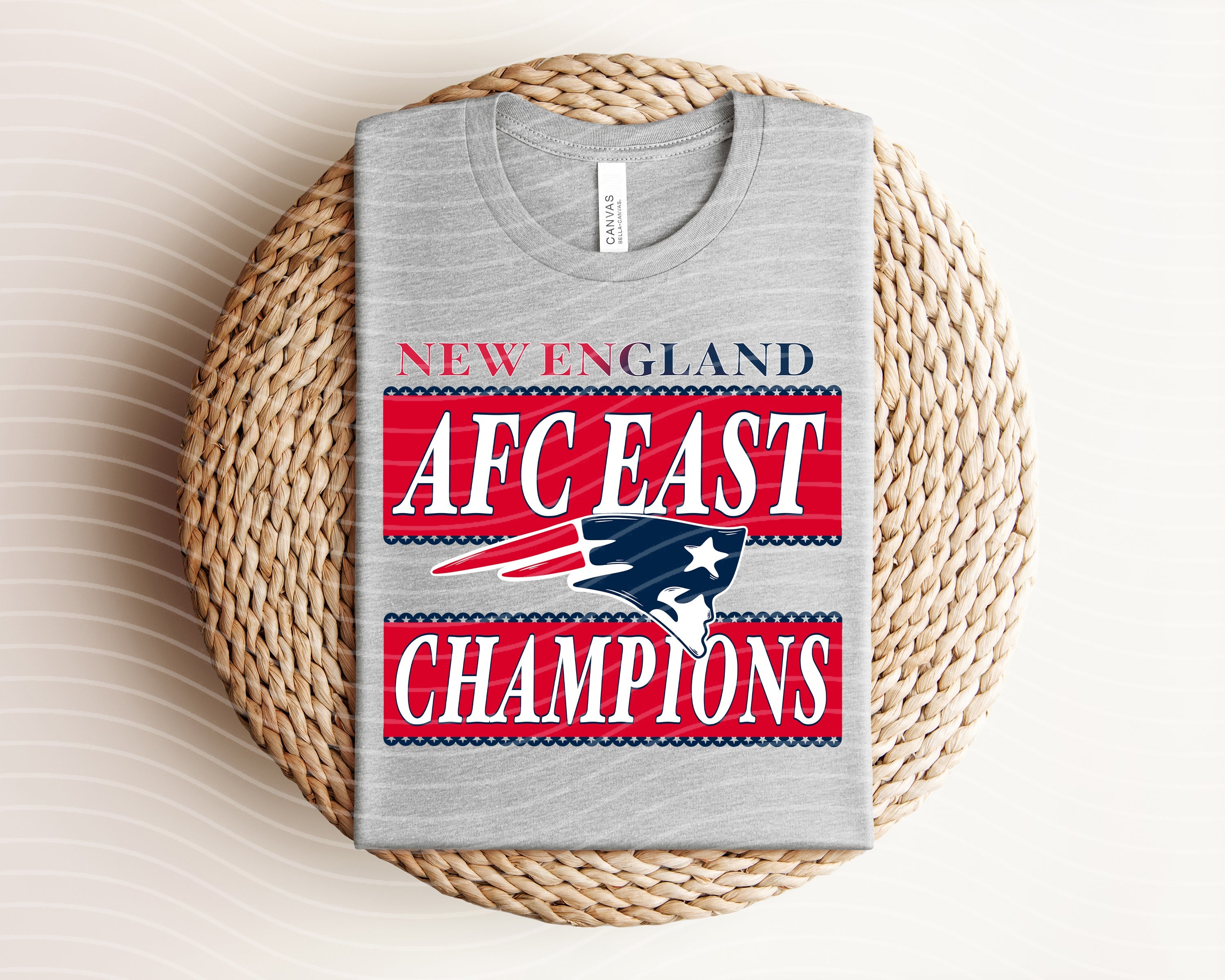 Red AFC East Champions Patriots graphic tee by Anchored Grace Boutique, featuring team logo and bold design on soft fabric.