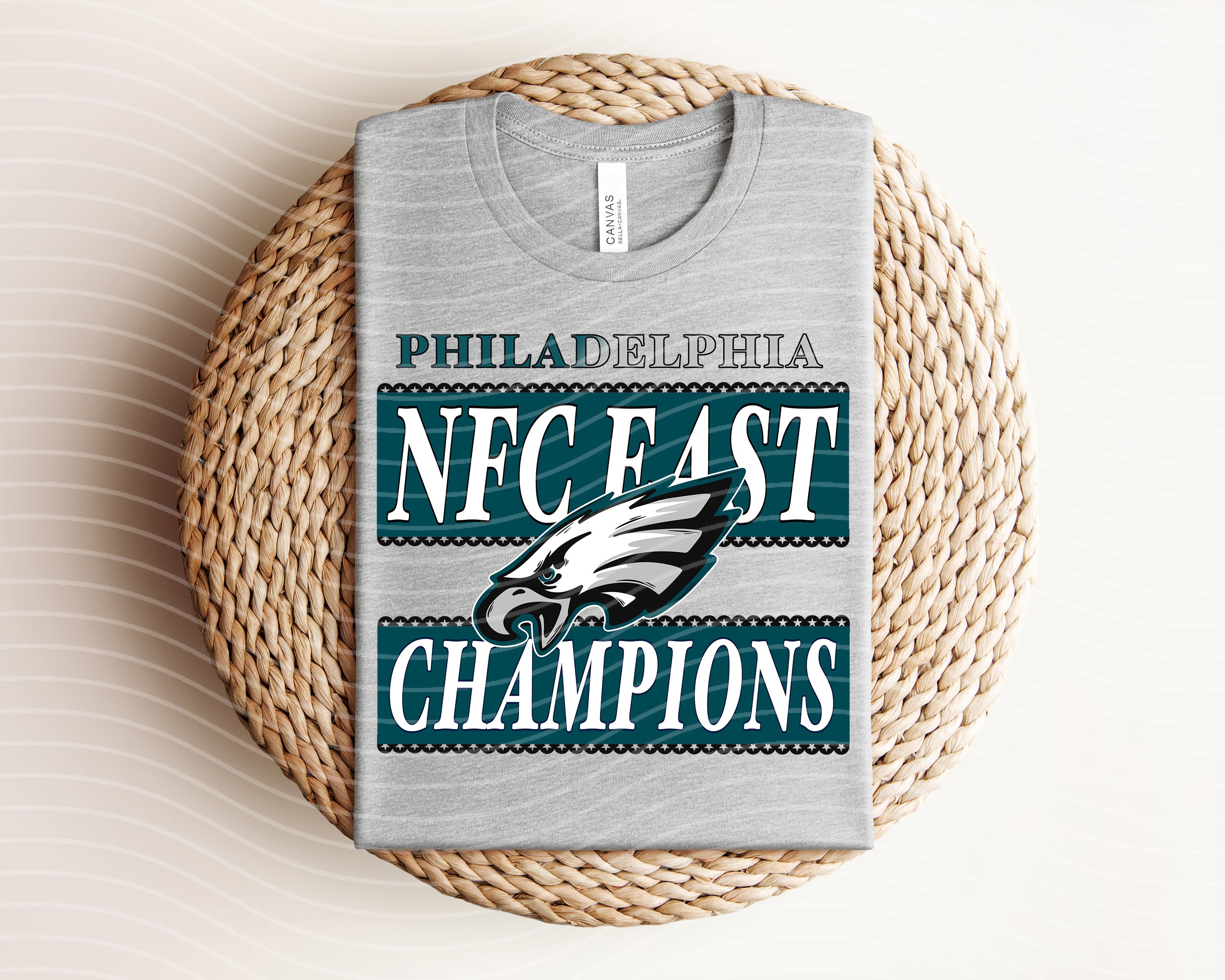 NFC East Champions Eagles graphic tee by Anchored Grace Boutique featuring team logo and bold design on a casual t-shirt