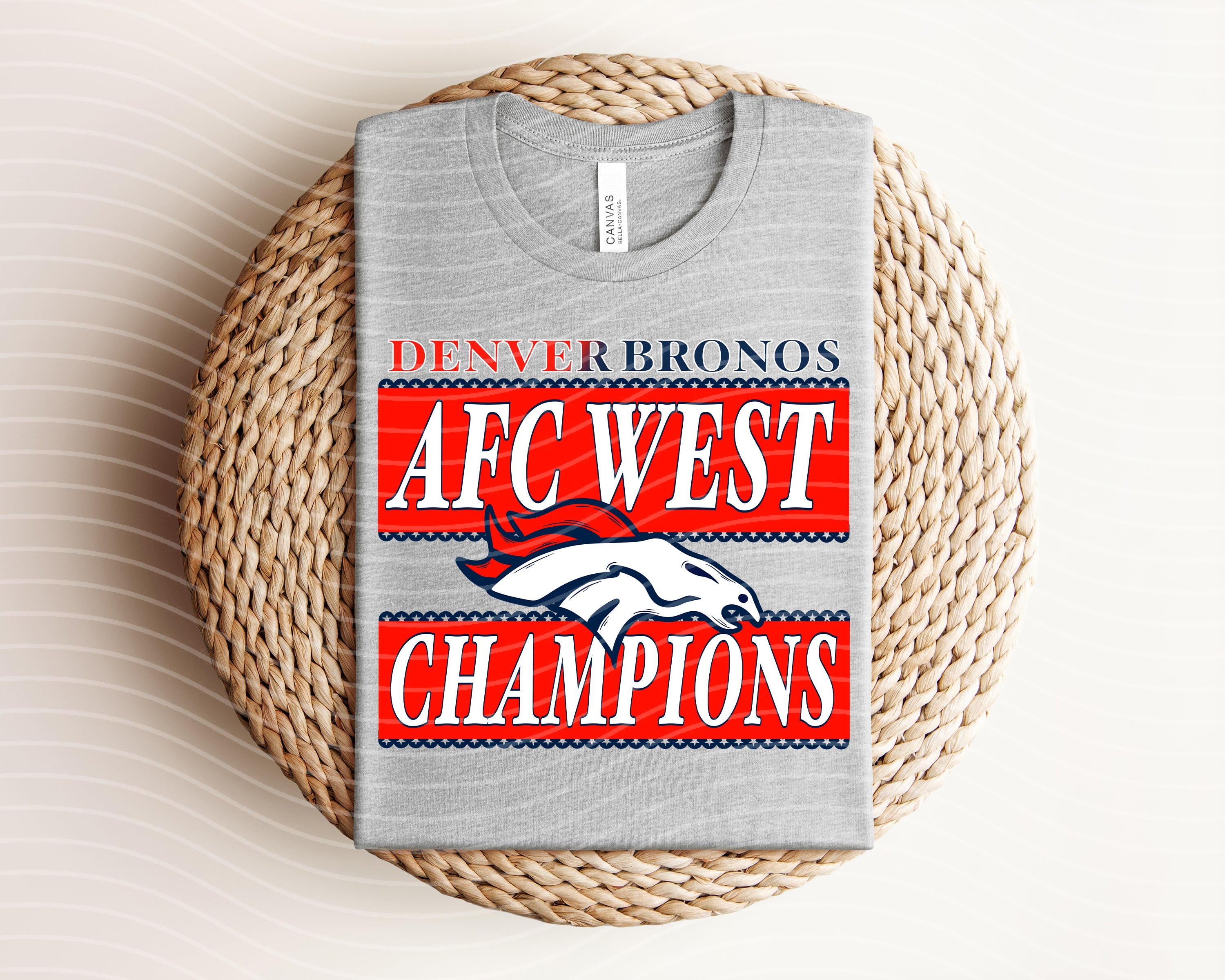 Dark gray AFC West Champions Broncos graphic tee by Anchored Grace Boutique, featuring team logo and championship design.
