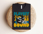 Playoff Bound Jaguars graphic tee in black fabric with vibrant team logo and text, casual apparel from Anchored Grace Boutique.