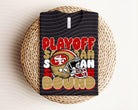 Playoff Bound 49ers graphic tee by Anchored Grace Boutique, featuring a bold football team design on a comfortable t-shirt.