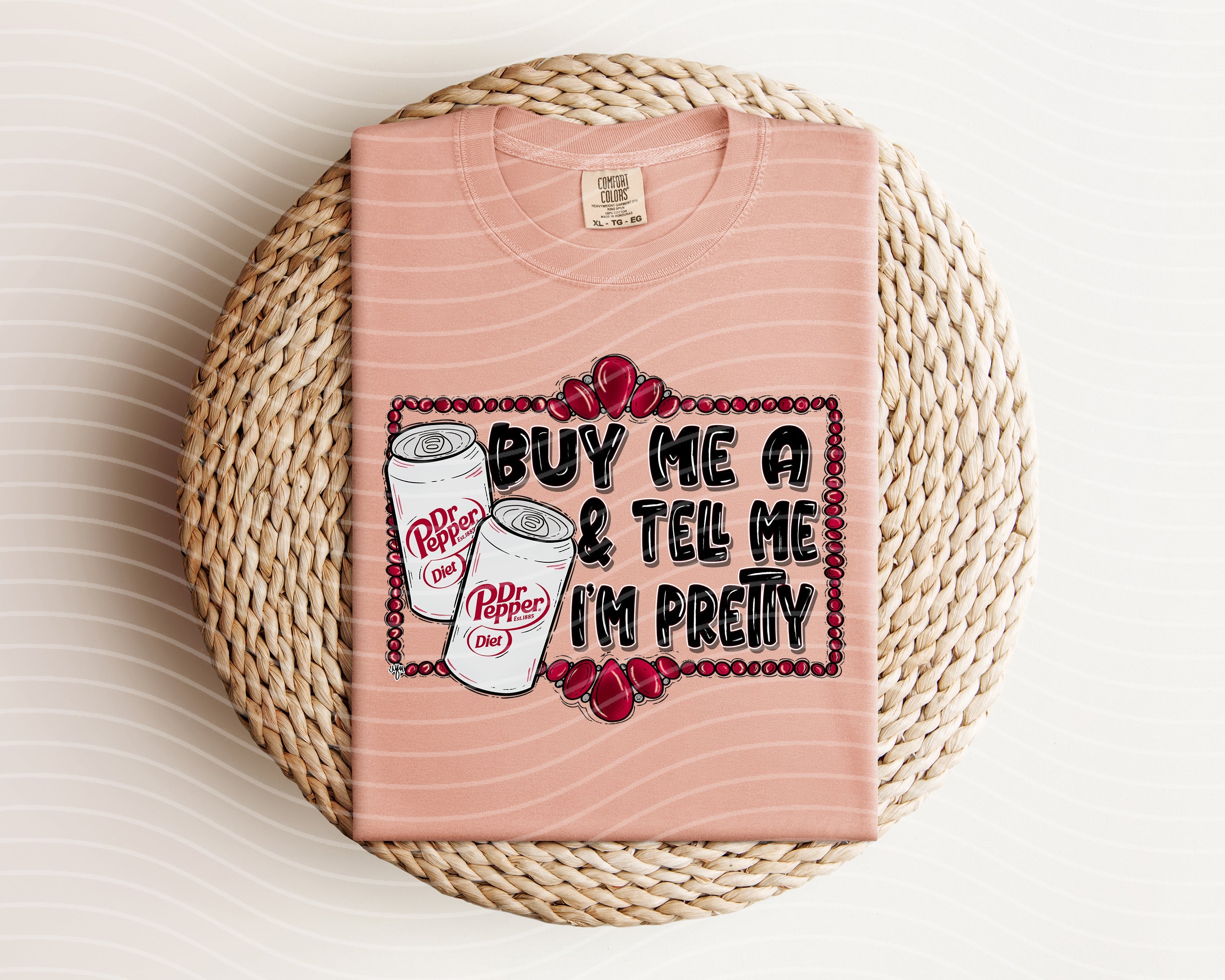 Graphic tee featuring "Buy Me a Diet Dr Pepper & Tell Me I'm Pretty" slogan from Anchored Grace Boutique, casual wear.