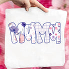 Pink and purple floral graphic tee with "Mama" name design from Anchored Grace Boutique, casual women's T-shirt.