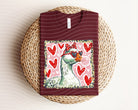 Leopard Love Goose graphic tee by Anchored Grace Boutique featuring a stylish cartoon goose with leopard print accents.
