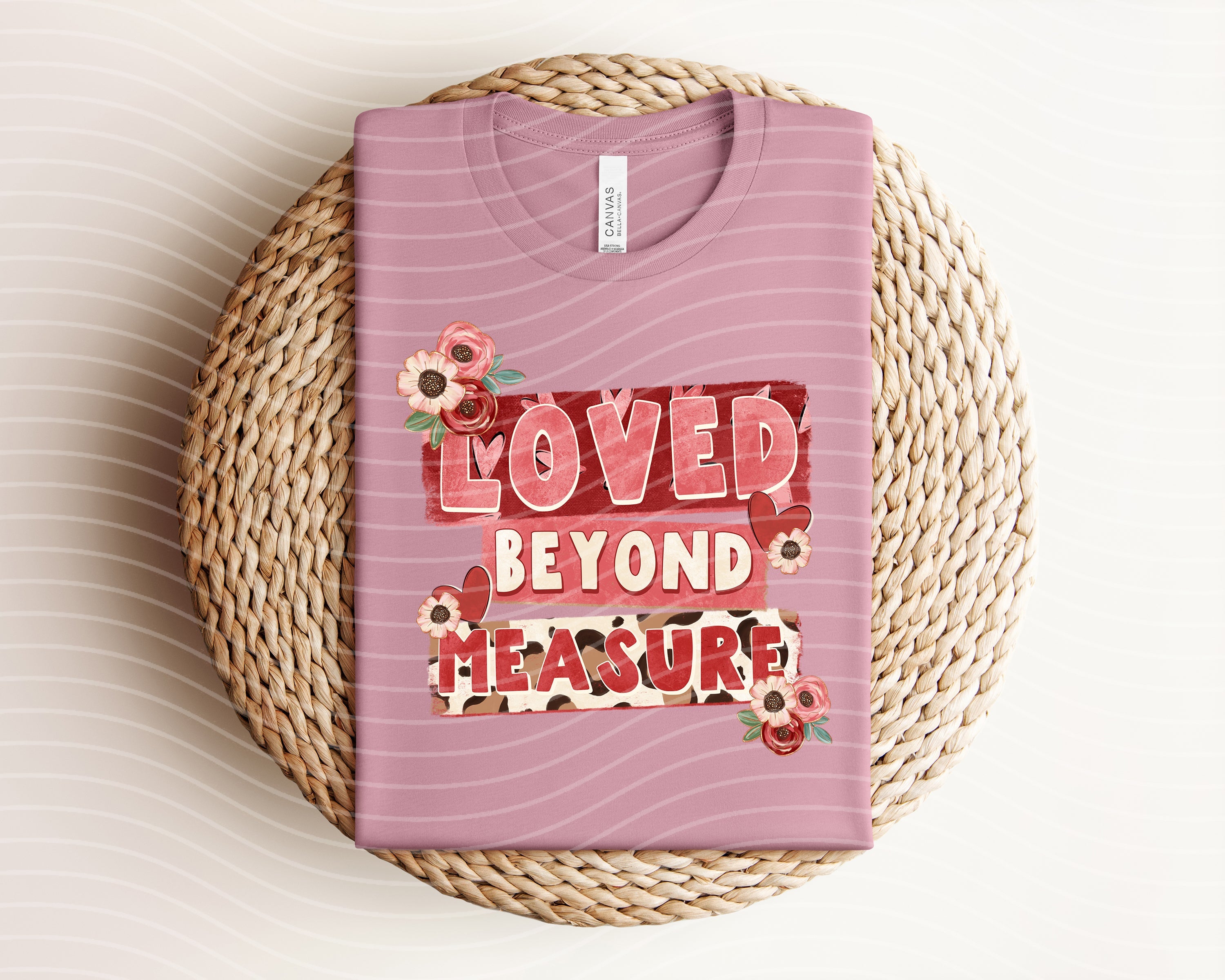 Loved Beyond Measure graphic tee by Anchored Grace Boutique, featuring a stylish design on a comfortable casual T-shirt.
