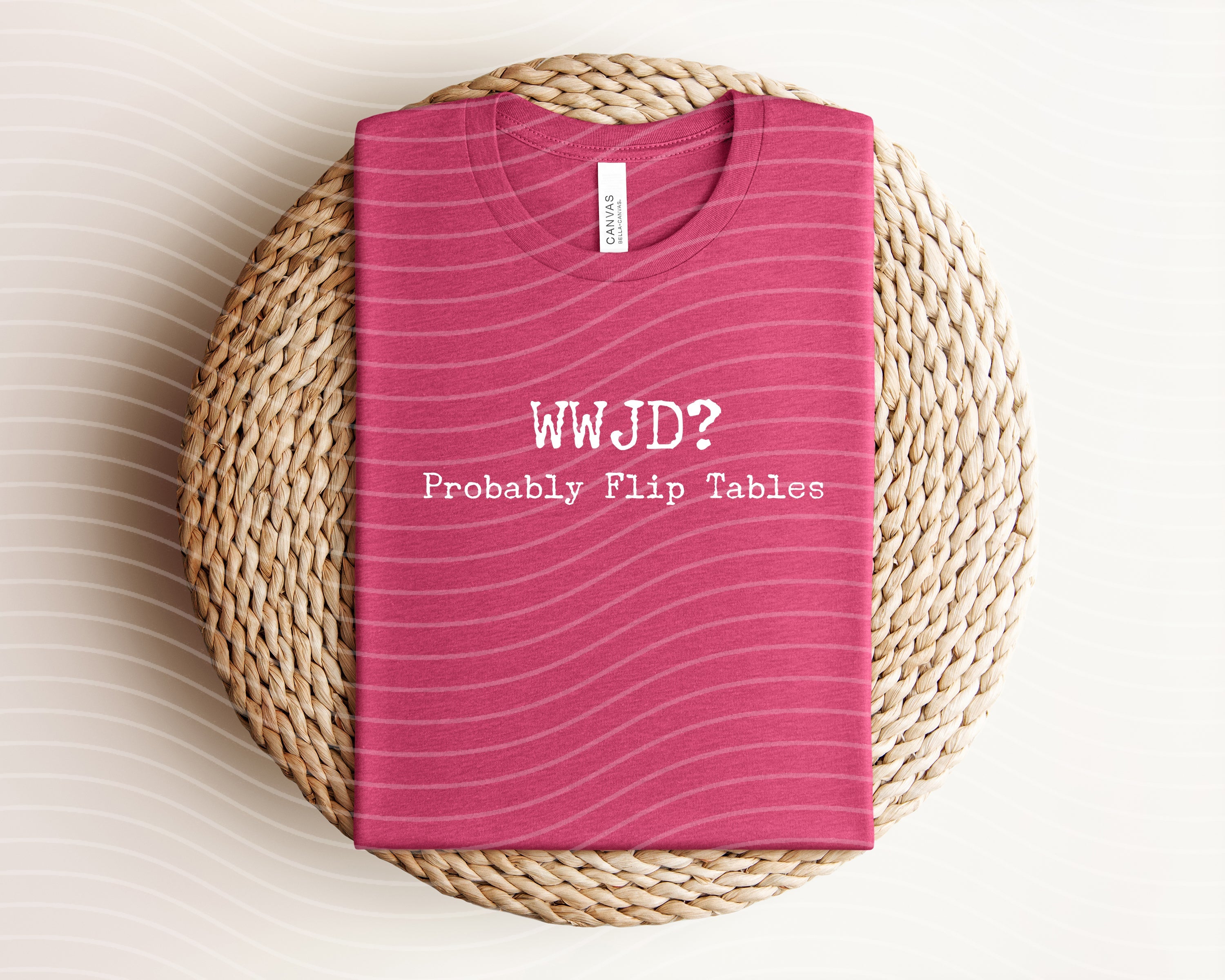 Black graphic tee with "WWJD Probably Flip Tables" design from Anchored Grace Boutique, casual shirt with bold text.