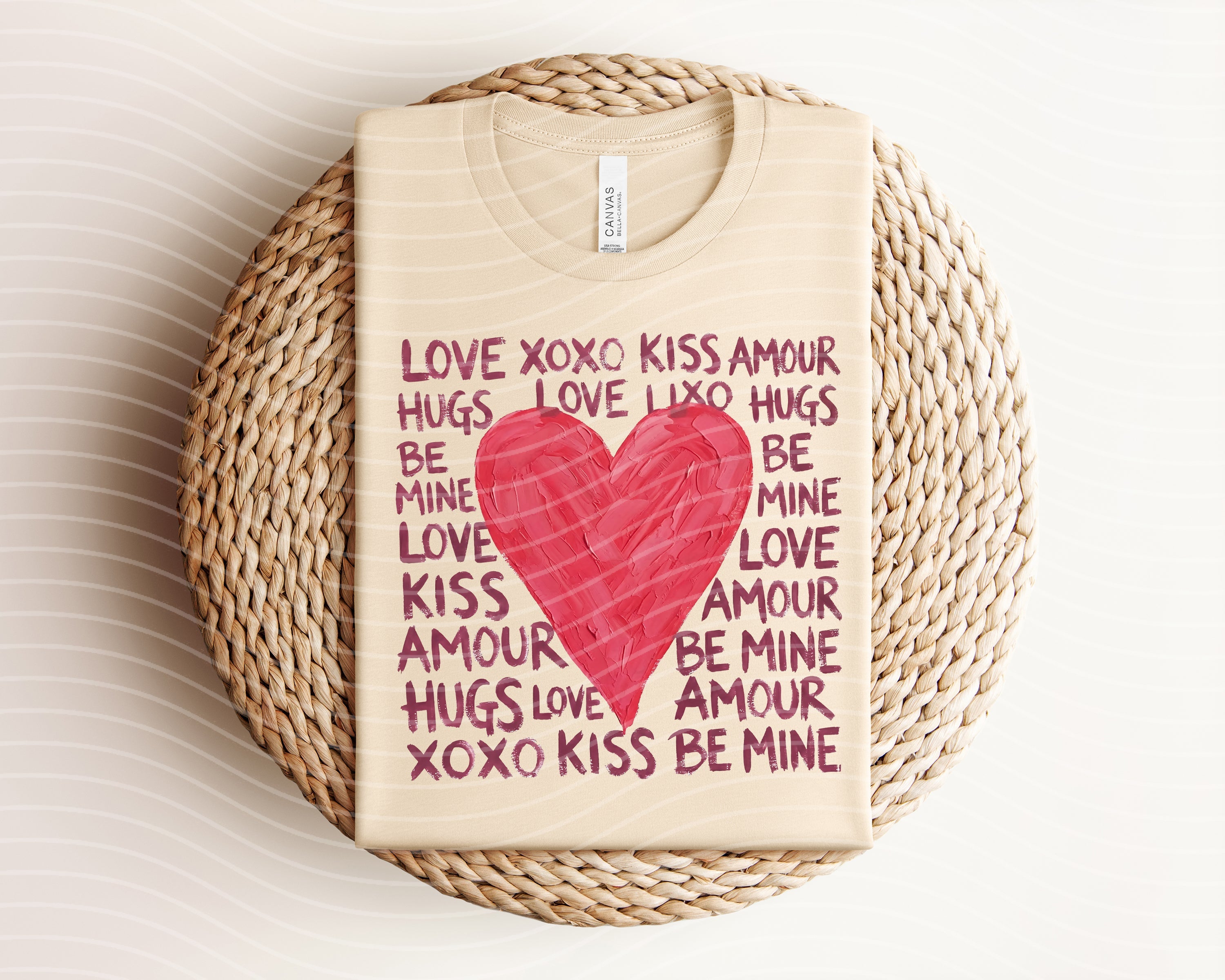 Love Kiss Amour graphic tee by Anchored Grace Boutique, featuring a stylish design on a casual cotton shirt.