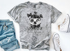 Anchored Grace Boutique graphic tee featuring a vibrant "Live Life in Full Bloom" floral design on soft fabric.