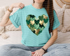 Green Hearts graphic tee by Anchored Grace Boutique, featuring a colorful heart graphic on soft fabric.