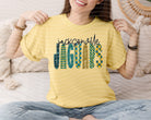 Anchored Grace Boutique Jaguars Doodle Font graphic tee showcasing a stylish, casual design with playful text and vibrant colors.