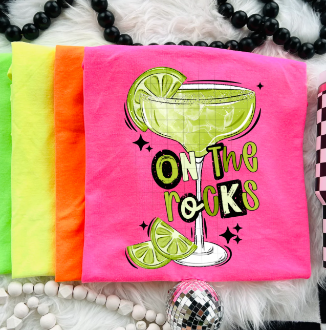 On the Rocks graphic tee by Anchored Grace Boutique featuring a stylish design on a comfortable cotton t-shirt.