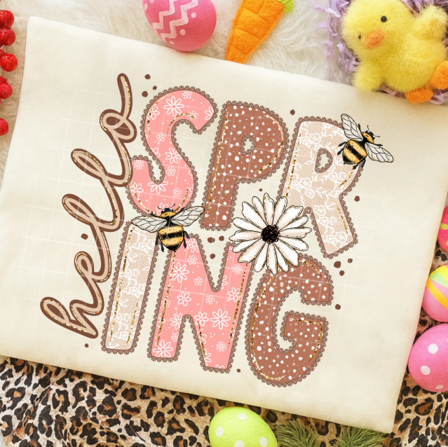 Hello Spring graphic tee by Anchored Grace Boutique, featuring vibrant spring-themed design and casual fit.
