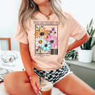 Find Me Where the Wildflowers Are graphic tee by Anchored Grace Boutique, featuring a floral-inspired design on a casual t-shirt.