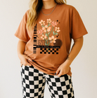 Enjoy the Little Things graphic tee from Anchored Grace Boutique featuring a casual, stylish cotton T-shirt with a positive message.