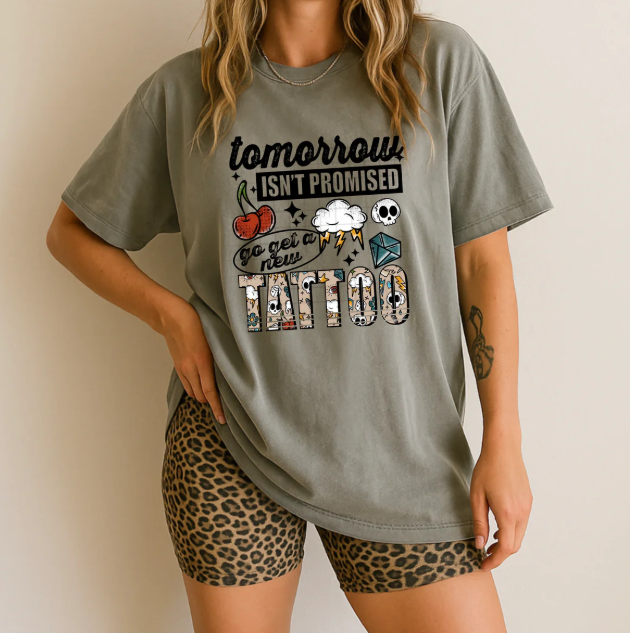 Black graphic tee from Anchored Grace Boutique with motivational "Tomorrow Isn't Promised" design on the front.