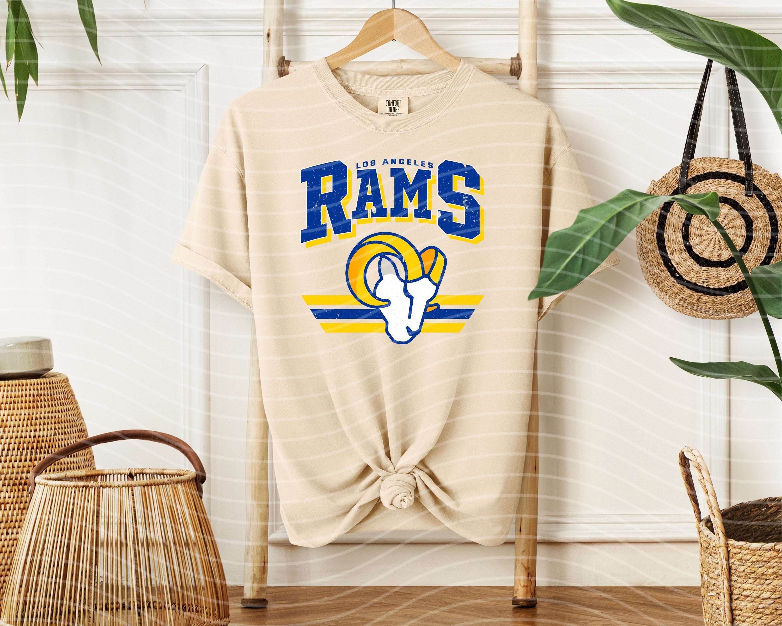 Vintage Team Rams graphic tee by Anchored Grace Boutique featuring a retro-inspired Rams logo on soft cotton fabric.