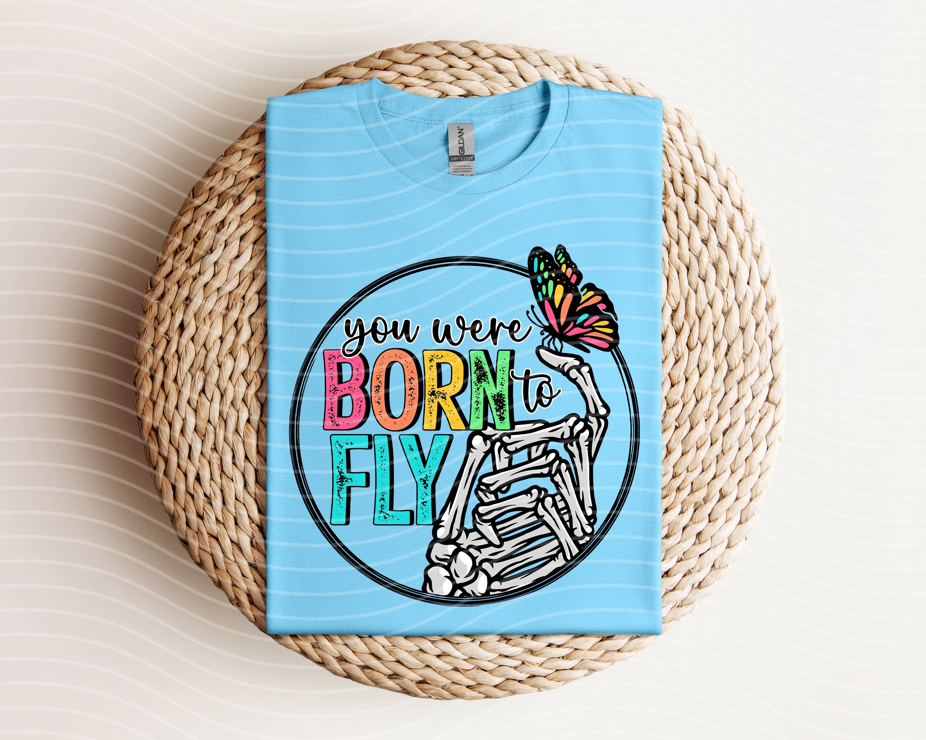 Black graphic tee from Anchored Grace Boutique featuring a "You Were Born to Fly" inspirational design on the front.