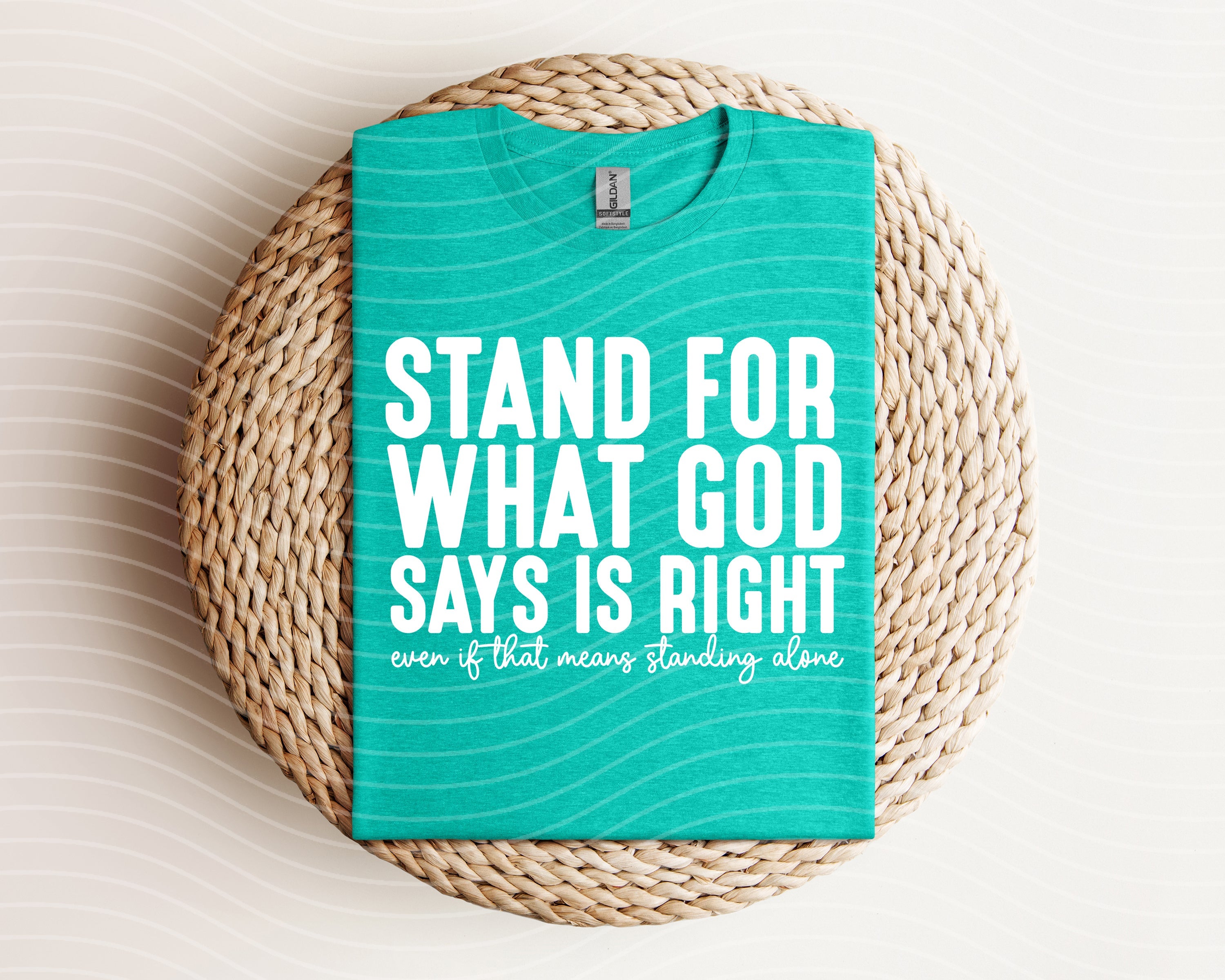 Black graphic tee from Anchored Grace Boutique with "Stand for What God Says is Right" slogan and biblical design.