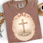 Framed cross graphic tee from Anchored Grace Boutique, casual t-shirt with religious cross design on front.