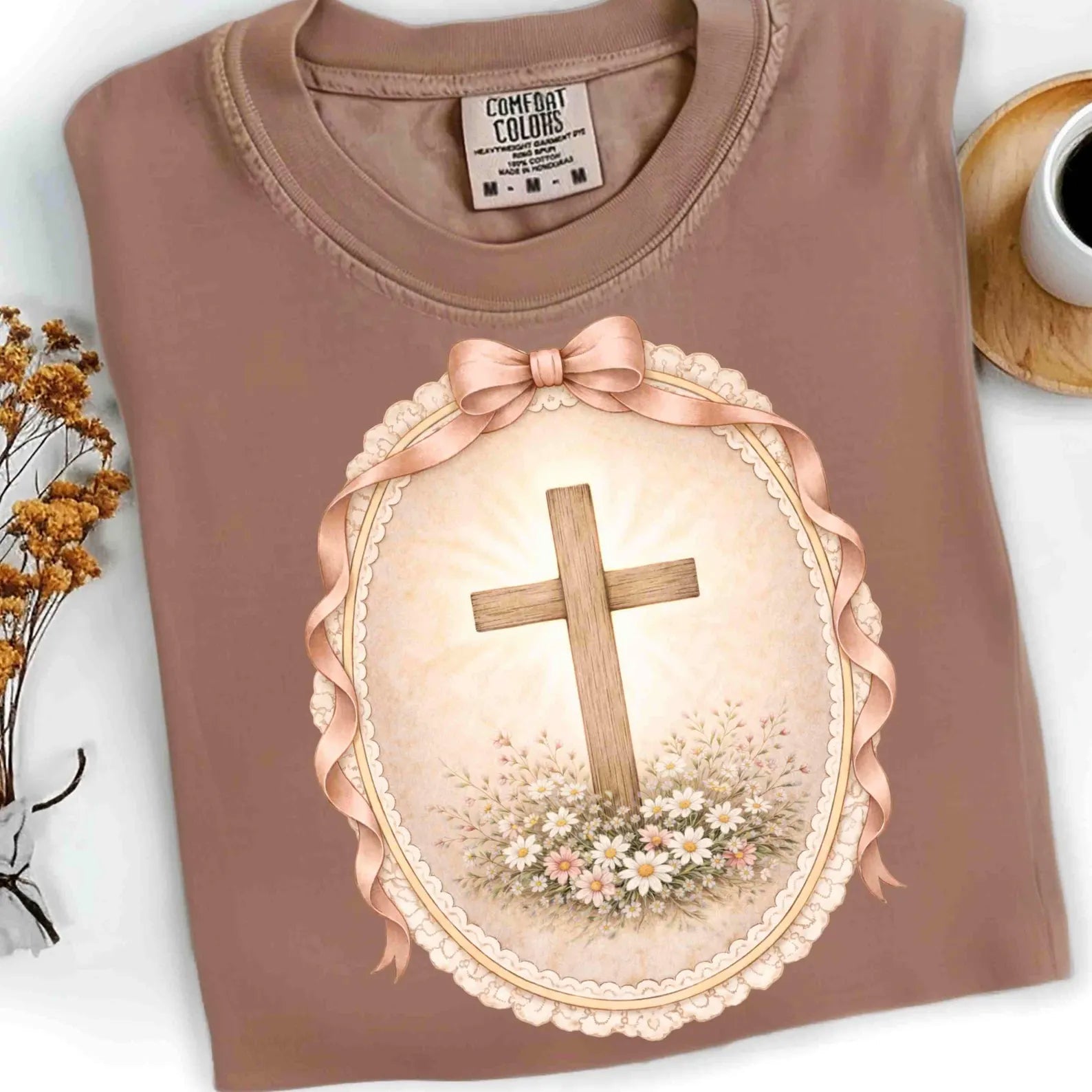 Framed cross graphic tee from Anchored Grace Boutique, casual t-shirt with religious cross design on front.