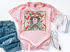 Leopard and raccoon graphic tee by Anchored Grace Boutique featuring a stylish animal print design on soft fabric.